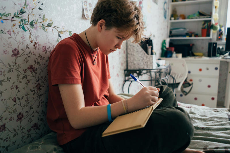 Teenage Girl Doing Homework While Sitting In The R 2023 11 27 05 13 45 Utc