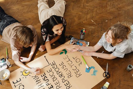 Young People Working On Recycle Poster