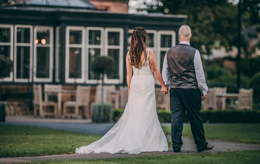 Bride And Her Father Standing Outside The Oakfield